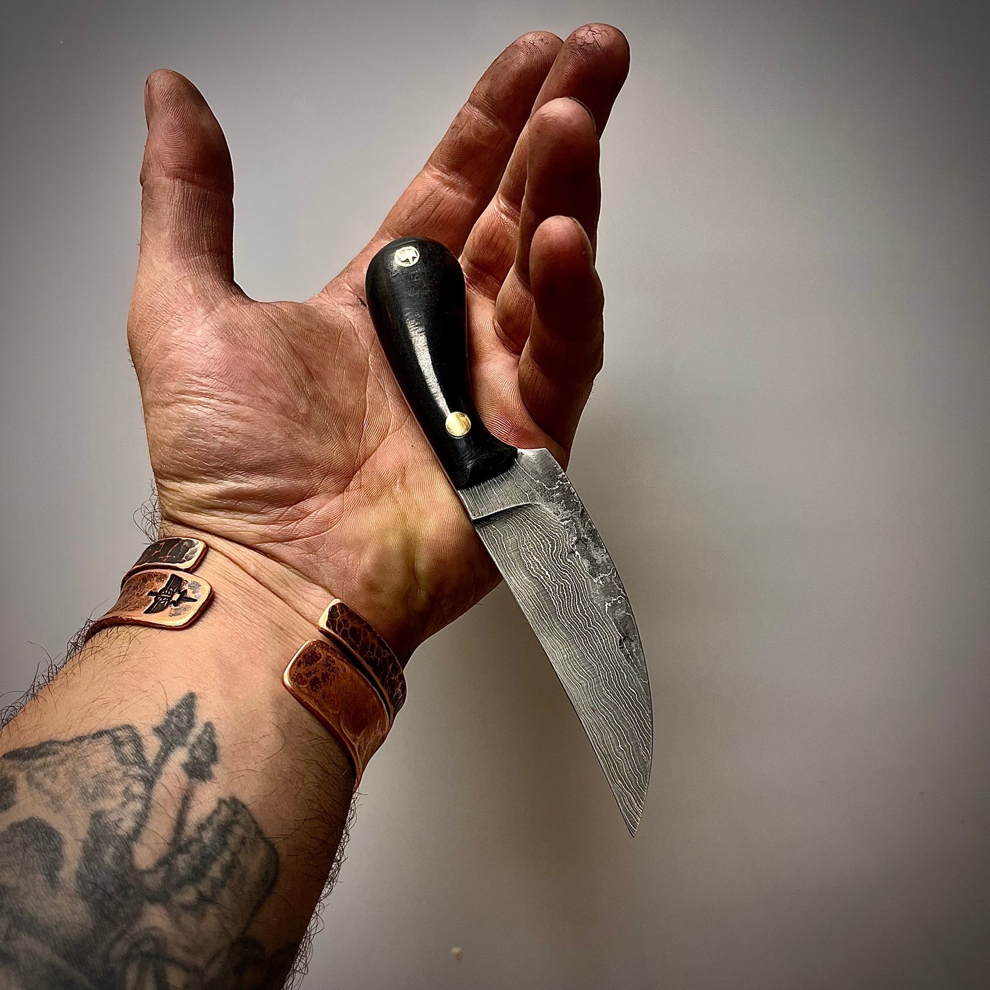 Damascus Steel Clinch Pick Knife with Kydex Sheath. Hand Forged in Montana.