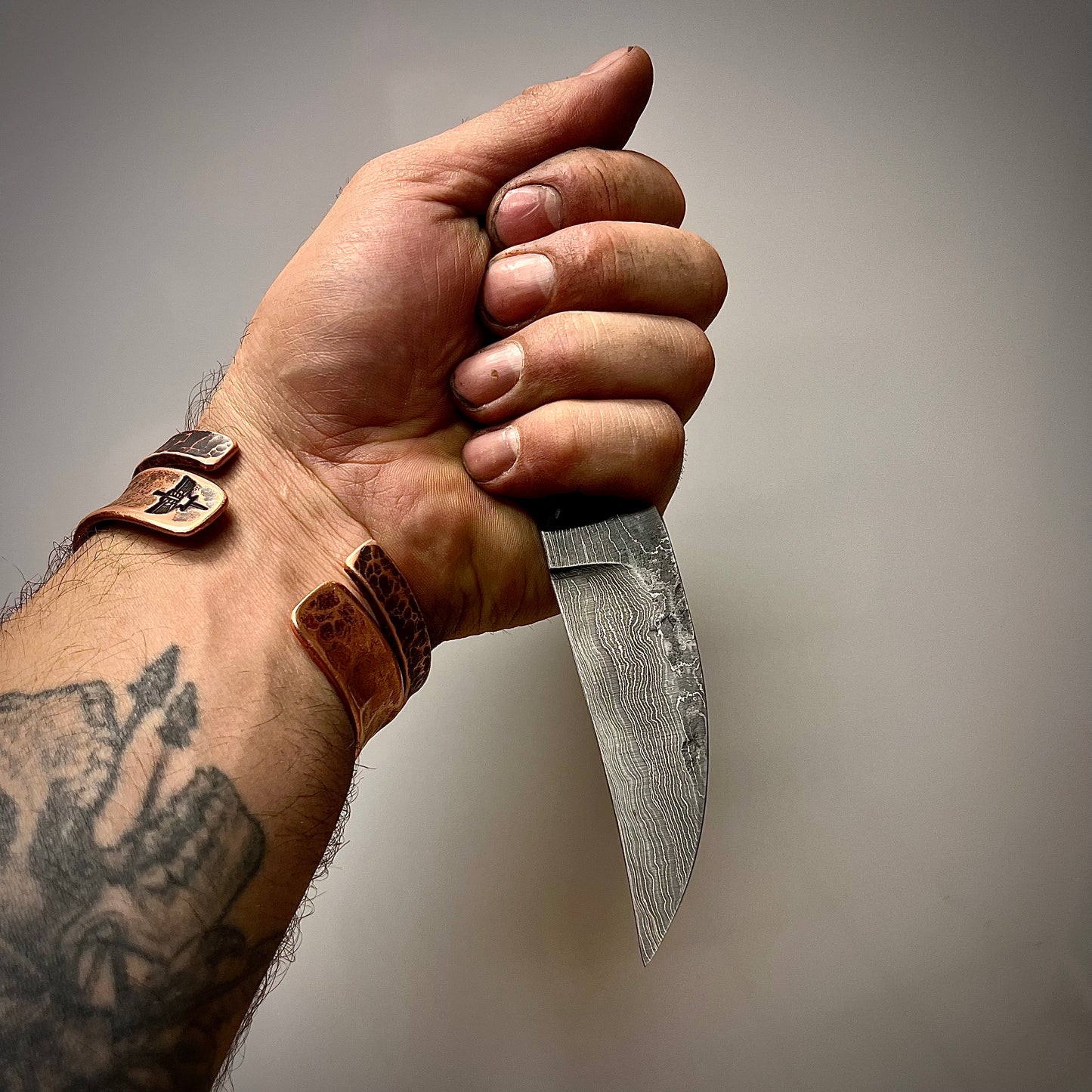 Damascus Steel Clinch Pick Knife with Kydex Sheath. Hand Forged in Montana.