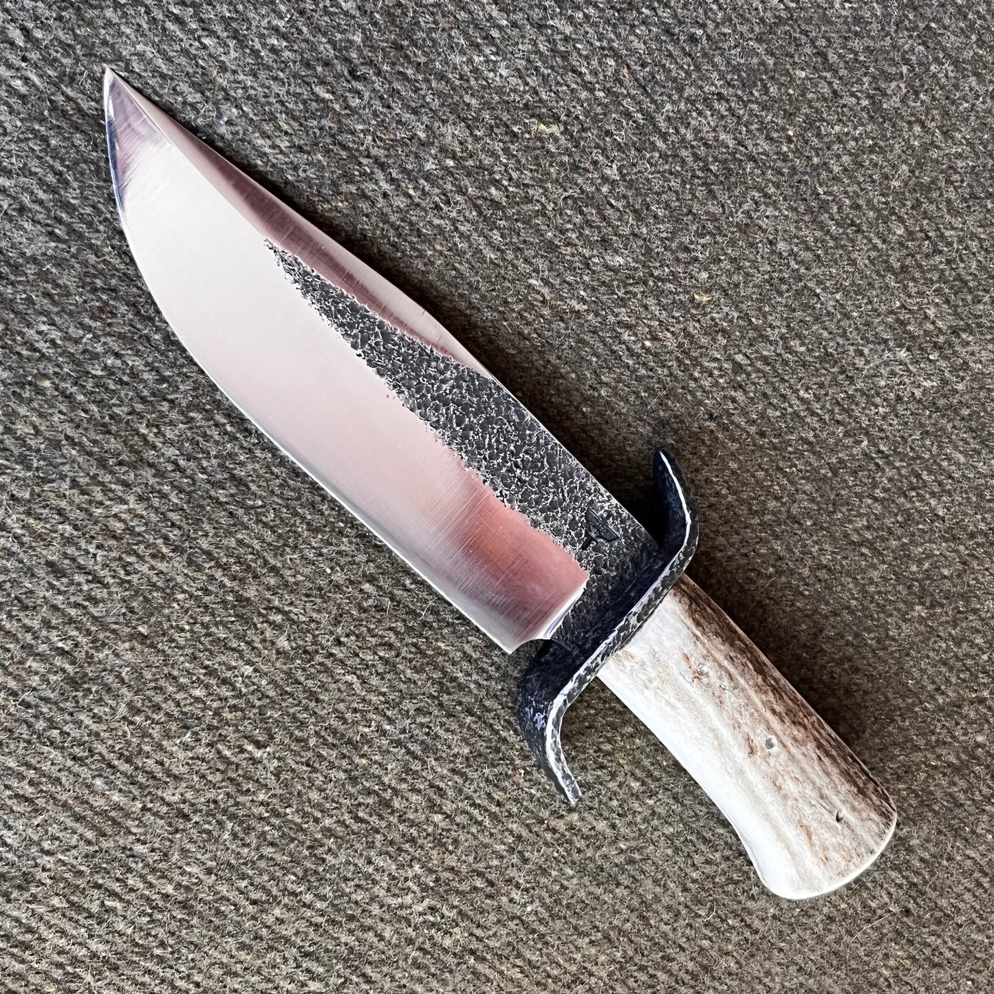 Custom Bowie Knife with Fringed Leather Sheath. Hand Forged in Montana.