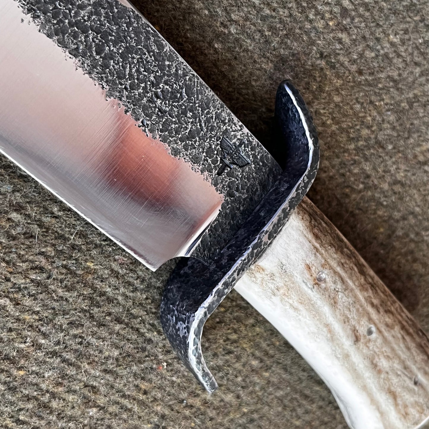 Custom Bowie Knife with Fringed Leather Sheath. Hand Forged in Montana.