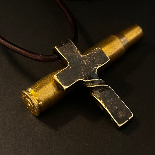 Brass Twisted CROSS PENDANT. Hand Forged in Montana. Made from recycled brass amm0 casings